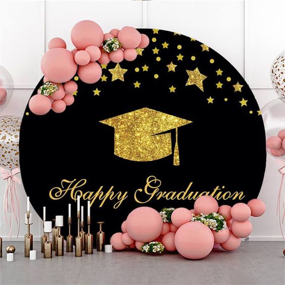 a circle Graduation Party Backdrop in pink and golden color theme